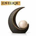 OVELIQE™ Solstice Arc & Orb Sculpture